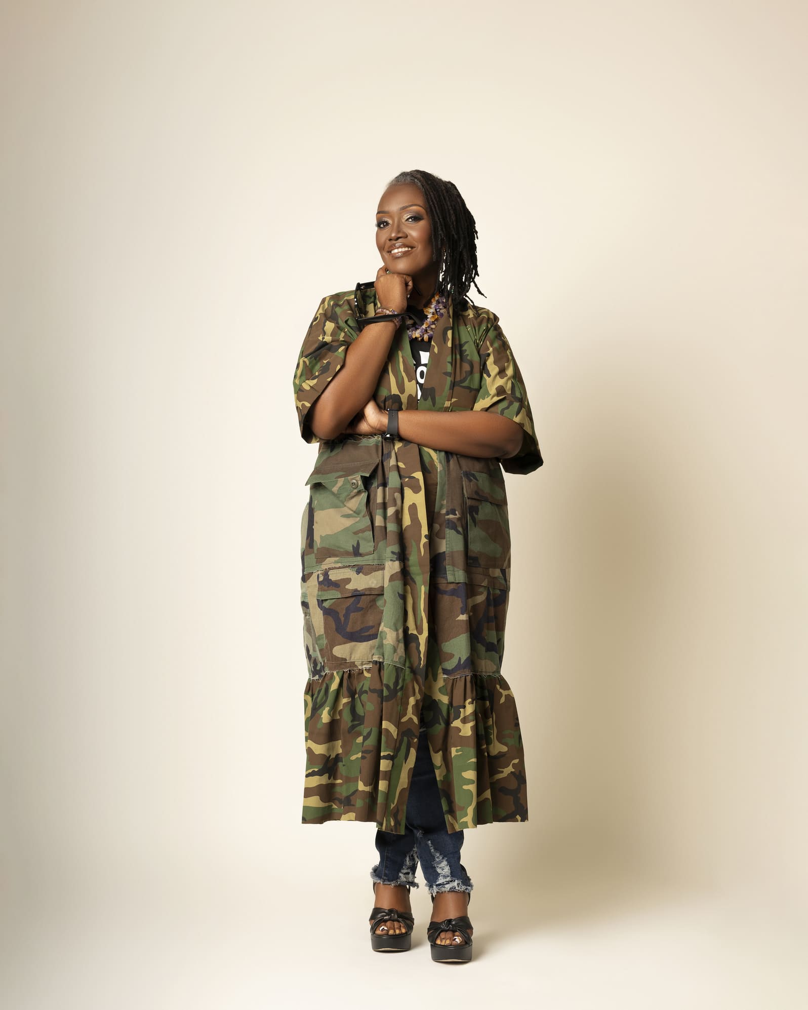 Sandra Stevens Smalls standing in camouflage attire